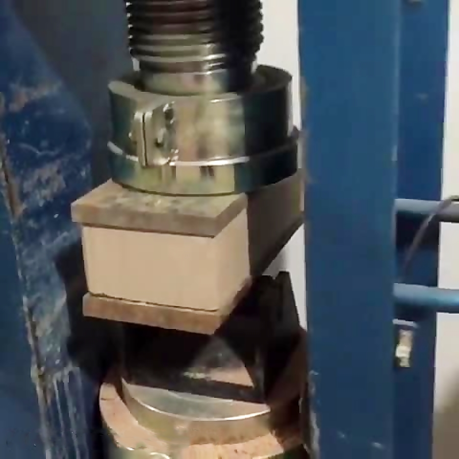 a metal object on a blue stand